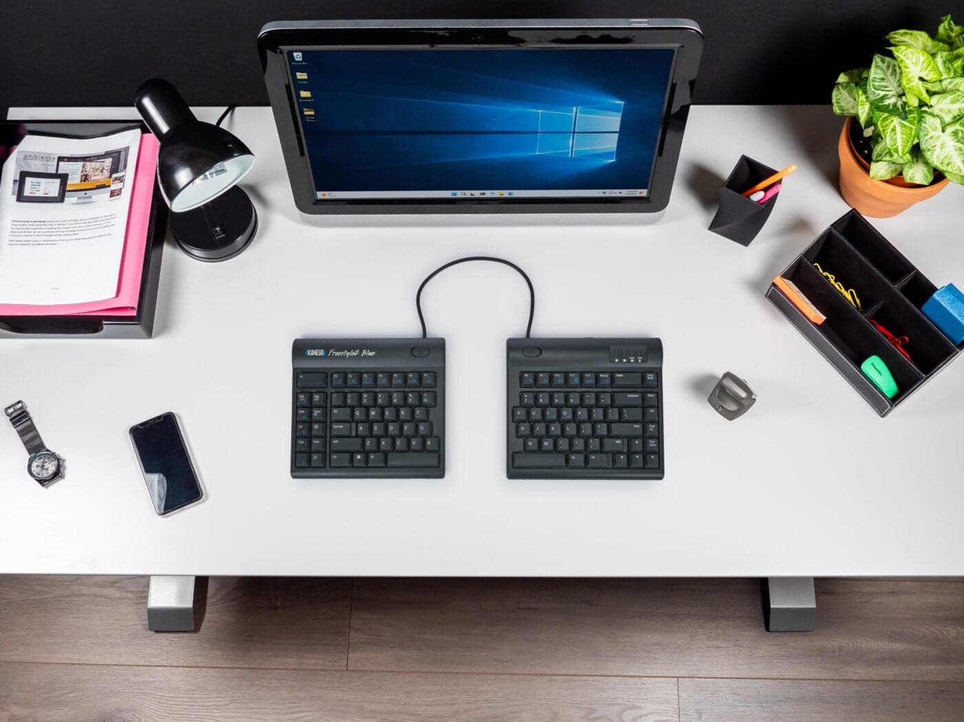 Kinesis Freestyle2 Blue split keyboard with its two halves apart on a desk